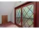 Game room with wooden doors leading to a deck overlooking the woods at 731 Airline Rd, Mcdonough, GA 30252