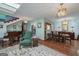 Living room with piano, armchair, and view of dining area at 731 Airline Rd, Mcdonough, GA 30252