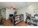 Home office with built-in shelving and hardwood floors at 731 Airline Rd, Mcdonough, GA 30252