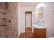 Updated bathroom with walk-in shower and modern vanity at 653 Temple St, Lithia Springs, GA 30122