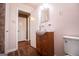 Updated bathroom with walk-in shower and modern vanity at 653 Temple St, Lithia Springs, GA 30122