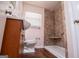 Updated bathroom with walk-in shower and modern vanity at 653 Temple St, Lithia Springs, GA 30122