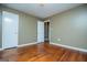 Spacious bedroom featuring hardwood floors and ample closet space at 653 Temple St, Lithia Springs, GA 30122