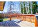 Wooden deck overlooking a fenced backyard at 653 Temple St, Lithia Springs, GA 30122
