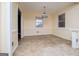 Well lit dining room with stylish light fixture at 653 Temple St, Lithia Springs, GA 30122