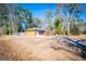 Brick ranch house with attached garage and driveway at 653 Temple St, Lithia Springs, GA 30122