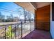 Front porch with view of the street and trees at 653 Temple St, Lithia Springs, GA 30122