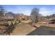 Expansive backyard featuring mature trees, providing ample space for outdoor activities and relaxation at 301 Dunstans Pass, Marietta, GA 30066
