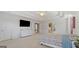 Spacious bedroom featuring a tray ceiling, with an ensuite bathroom and a TV at 301 Dunstans Pass, Marietta, GA 30066