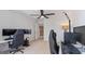 Bedroom with gaming setups, neutral walls, and ample space for activities at 301 Dunstans Pass, Marietta, GA 30066