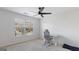 Bedroom with a work desk, chair, carpeted floors, and a large window with a view at 301 Dunstans Pass, Marietta, GA 30066