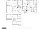 Detailed floor plan showcasing the layout of the main floor, including kitchen, living room, and garage at 301 Dunstans Pass, Marietta, GA 30066