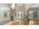 Inviting foyer boasts hardwood floors, soaring ceilings, and a decorative glass front door at 301 Dunstans Pass, Marietta, GA 30066