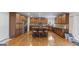Well-equipped kitchen featuring dark wood cabinets, granite countertops, and stainless steel appliances at 301 Dunstans Pass, Marietta, GA 30066