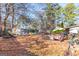 Large backyard with shed and garden area at 5899 Meadow Ln, Rex, GA 30273