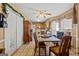 Kitchen and dining area with wood table and chairs at 5899 Meadow Ln, Rex, GA 30273