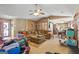 Spacious living room with a view of the kitchen and dining areas at 5899 Meadow Ln, Rex, GA 30273