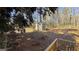 View of the backyard with a storage shed, offering practical outdoor storage solutions at 60 Sweet Bay Ln, Carrollton, GA 30116