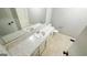 Bathroom featuring a single sink vanity with marble countertop and neutral paint at 60 Sweet Bay Ln, Carrollton, GA 30116