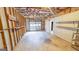 Spacious unfinished garage with exposed framing and shelving at 60 Sweet Bay Ln, Carrollton, GA 30116