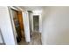 Bright hallway with durable flooring leads to a bedroom in this charming home at 60 Sweet Bay Ln, Carrollton, GA 30116
