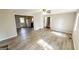 Open-concept living space with new floors, ideal for entertaining and comfortable living at 60 Sweet Bay Ln, Carrollton, GA 30116