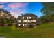 Expansive backyard with deck and ample space for outdoor activities at 4780 Rambling Rose Dr, Cumming, GA 30040