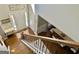 Bright foyer features hardwood floors, staircase and an elegant front entrance at 4780 Rambling Rose Dr, Cumming, GA 30040