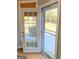 View of patio through glass paneled back door at 4780 Rambling Rose Dr, Cumming, GA 30040