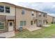 Private patio and grassy area behind the townhome at 4121 Fulson Dr, Lilburn, GA 30047