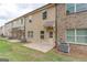 Private patio and grassy area behind the townhome at 4121 Fulson Dr, Lilburn, GA 30047
