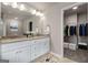 Bathroom with double vanity, soaking tub, and walk-in shower at 4121 Fulson Dr, Lilburn, GA 30047