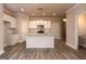 Modern kitchen with island, stainless steel appliances, and white cabinets at 4121 Fulson Dr, Lilburn, GA 30047