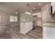 Modern kitchen with island and stainless steel appliances at 4121 Fulson Dr, Lilburn, GA 30047