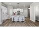 Modern kitchen with island and stainless steel appliances at 4121 Fulson Dr, Lilburn, GA 30047