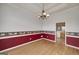 Traditional dining room with hardwood floors and a decorative chandelier at 253 Edenwylde Ct, Hampton, GA 30228