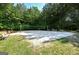 Sand volleyball court with benches nearby at 205 Stonehaven Dr, Fayetteville, GA 30215