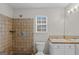 Bathroom with shower, toilet and vanity with wood countertop at 1801 Stroud Rd, Mcdonough, GA 30252