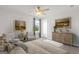 Relaxing bedroom with natural light, calm colors, and comfortable furniture at 214 Kindness Cir, Mcdonough, GA 30252