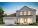 Newly constructed two-story brick home with a covered porch and an attached two-car garage at 214 Kindness Cir, Mcdonough, GA 30252