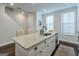 Modern kitchen island with granite countertop and stainless steel appliances at 2893 Elmwood Se Dr, Smyrna, GA 30080