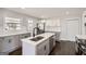 Modern kitchen with gray cabinets, white countertops, and island at 5603 Owens Dr, Austell, GA 30106