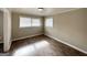 Bright bedroom with neutral walls and wood-look flooring at 1271 Avonwood Sw Cir, Atlanta, GA 30311