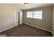 Bright bedroom with carpet flooring and built-in closet at 1271 Avonwood Sw Cir, Atlanta, GA 30311