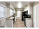 Modern kitchen with granite counters and stainless steel appliances at 1271 Avonwood Sw Cir, Atlanta, GA 30311