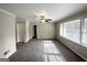 Spacious living area with wall-to-wall carpeting and lots of light at 1271 Avonwood Sw Cir, Atlanta, GA 30311