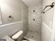 Updated bathroom with a walk-in shower and marble tile at 1931 Sandringham Sw Dr, Atlanta, GA 30311