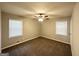 Comfortable bedroom with neutral carpeting and window coverings at 1931 Sandringham Sw Dr, Atlanta, GA 30311