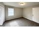 Bright bedroom with carpet, double closet, and window at 1931 Sandringham Sw Dr, Atlanta, GA 30311