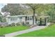 Charming ranch home with a landscaped yard and carport at 1931 Sandringham Sw Dr, Atlanta, GA 30311